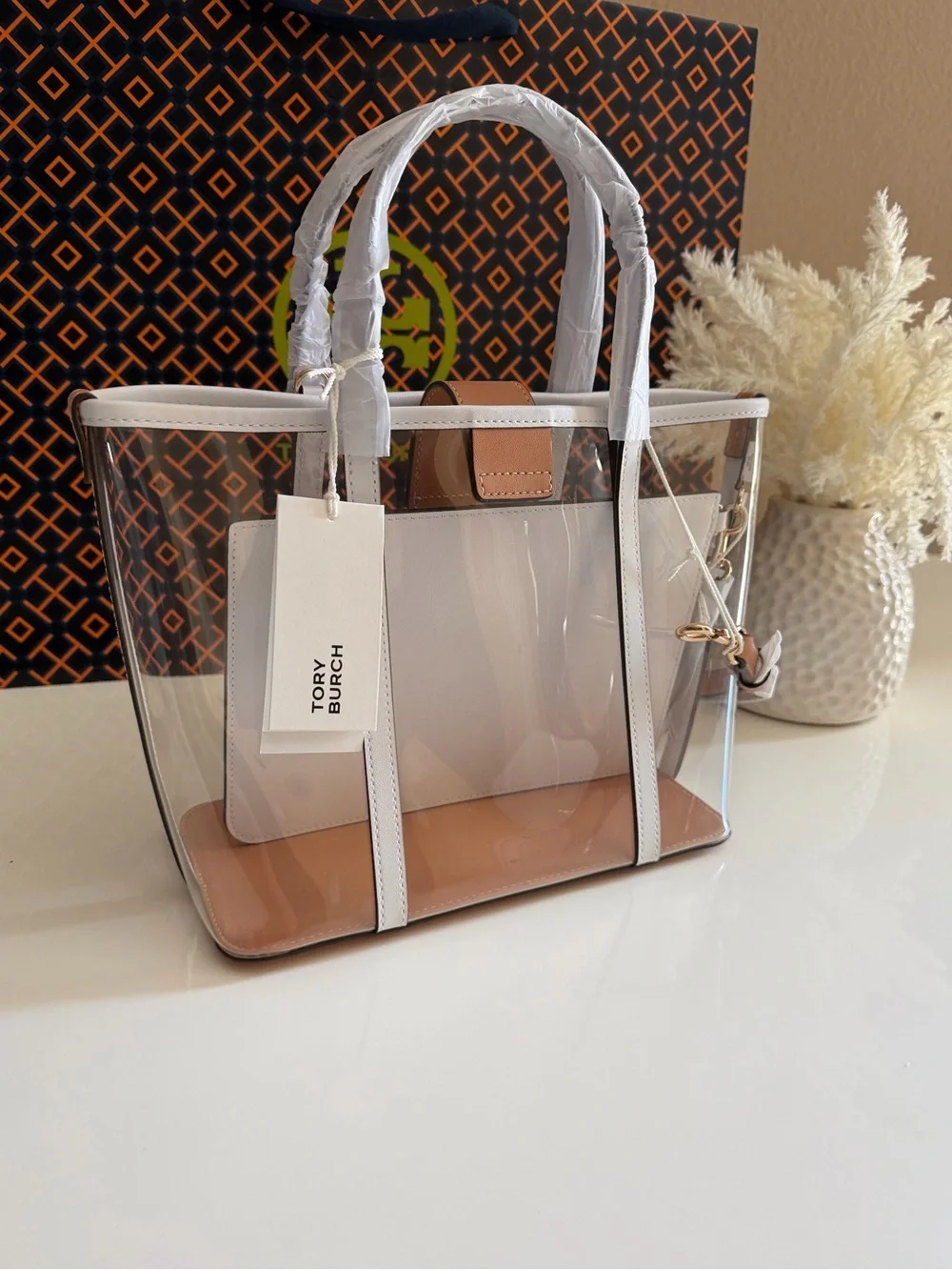 Tory Burch height 19